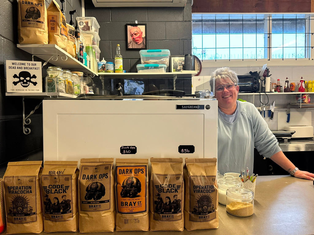 The FRANNKLY ROASTED range on the cafe counter at Bray St Coffee Roasters